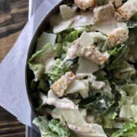 Caesar Salad · Crisp romaine lettuce with homemade croutons, imported grated cheese and our Caesar dressing.