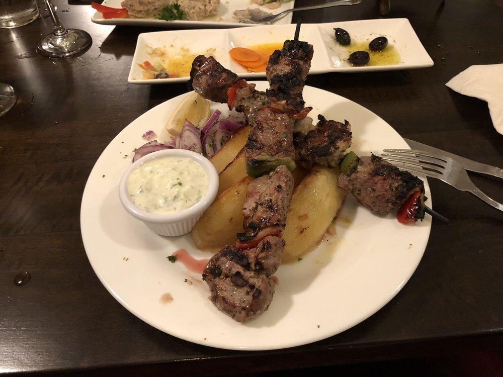 Lamb Souvlaki · Pork cubed, skewered with peppers and onions. Chargrilled. Gluten-free.