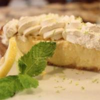 Lemon Pie Slice · Thick lemon custard pie in fresh Graham cracker crust.