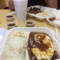 Loco Moco · Islander's style., 2 hamburger steaks served over rice covered with brown gravy and topped w...