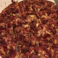 Meat Lovers Pizza · Sausage, pepperoni, ham and bacon.