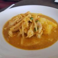 Red Curry · Choice of protein with eggplant, bell pepper, bamboo shoot and basil in rich red curry and c...