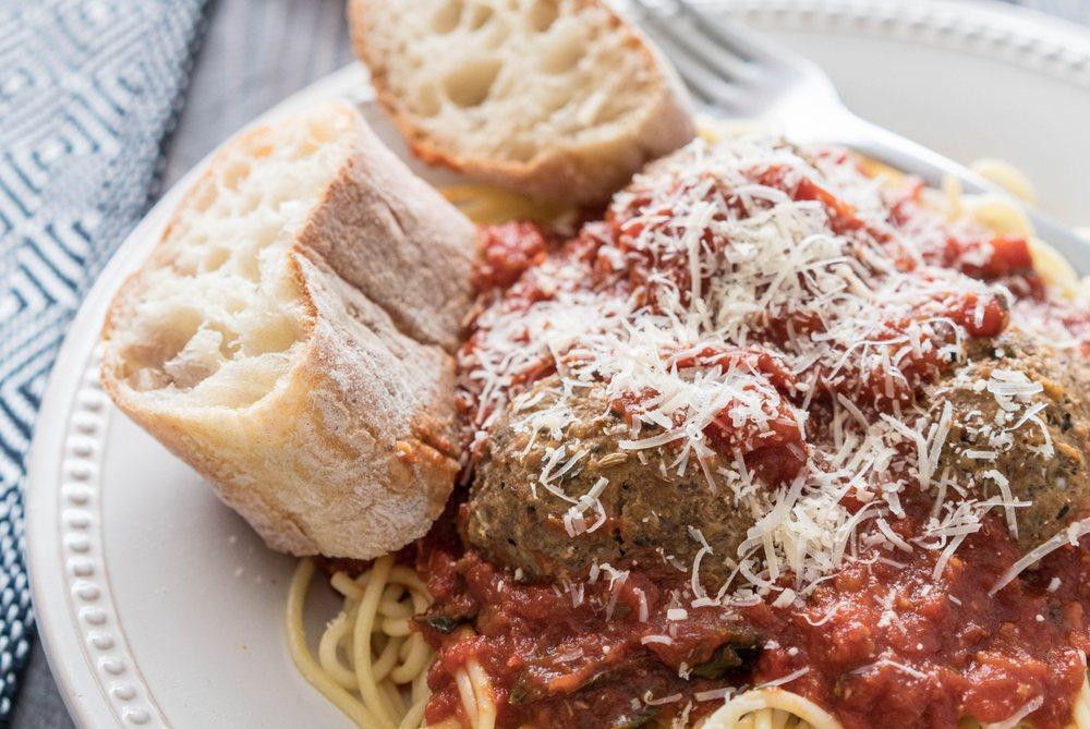 Spaghetti and Meatballs · 2 handmade beef and pork meatballs, house-made marinara and Parmesan.