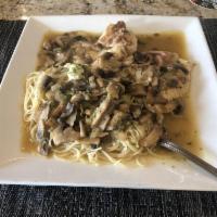 Chicken Marsala · Prosciutto, mushrooms, onions and marsala wine.