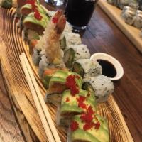Out of Control Roll · Shrimp tempura, mango roll. Topped with spicy crunch tuna. Avocado, tobiko& eel sauce. Raw.