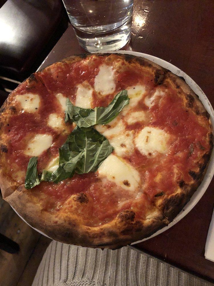 Margherita Pizza · Mozzarella, tomato sauce, basil. Vegetarian.