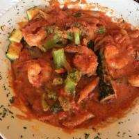 Penne Mello Bello · Penne sauteed with shrimp, broccoli, zucchini and mushrooms in a pink sauce.