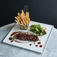 Steak Frites · Grilled hanger steak, Red wine reduction, Side frites and Mixed greens