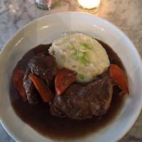 Coq Au Vin · Braised chicken, Carrots, Mushrooms, Red wine demi-glace, Mashed potatoes