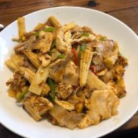 Pad Kee Mao · Basil stir-fried with flat rice noodles with onions, red and green bell peppers, straw mushr...