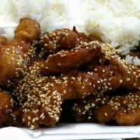 Sesame Chicken · Breaded white meat with broccoli in a sweet sauce and topped with sesame seeds.