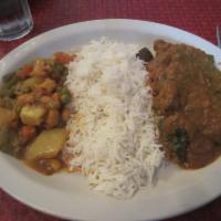 Lamb Curry · Lamb cooked with tomatoes and onion in thick sauce.