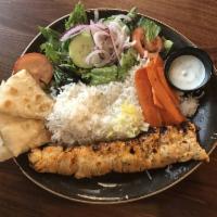 Flat Cut Chicken Kabob Plate · Thinly cut pieces of savory chicken.