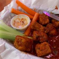 Vegan Wings · Baked seitan, served with carrots, celery, and your choice of dipping sauce.