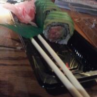 Spicy Tuna Roll · 6 pieces. Spicy tuna and cucumber. Served with ginger wasabi and soy sauce.