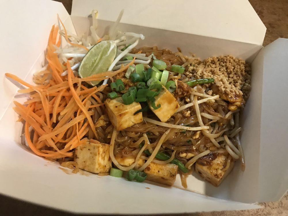 Pad Thai · Served with choice of sauce the most Thai famous dish. Stir fried thin noodle, beans sprouts, green onion, eggs, topped with carrot, cabbages and ground peanut.