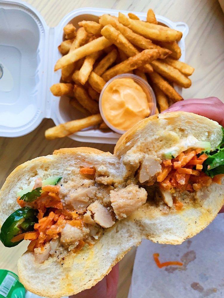 Lemongrass Chicken Sandwich · Pickled carrots and daikon, cucumber, green onions, cilantro, jalapeno, and mayo.