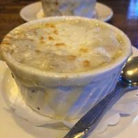 Homemade French Onion Soup · Served with toasted croutons, melted Swiss, and mozzarella.