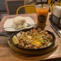 Pork Sisig · Sizzing Pork topped with Sunnyside-up egg served with steamed rice