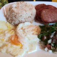 Spamsilog · Bacon flavored spam served with garlic fried rice & 2 fried eggs