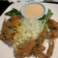 Soft Shell Crab · Fried gigantic soft shell crab in light batter served with ponzu sauce.