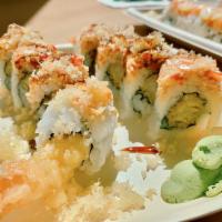 Red Dragon Roll · Shrimp tempura, avocado,tempura flakes, topped with spicy crab salad.