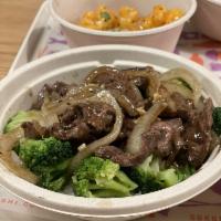 Beef and Broccoli Combo · Wok-style sautéed beef with broccoli and onion. Served over steamed white rice and topped of...