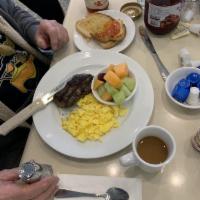 Angus Top Sirloin Steak and Eggs · 2 eggs any style, choice of side, toast and served with sirloin steak charbroiled to your in...