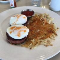 Corned Beef Hash and 2 Poached Eggs · Served with two Poached Eggs. Cooked crispy on the outside and moist on the inside. Choice o...