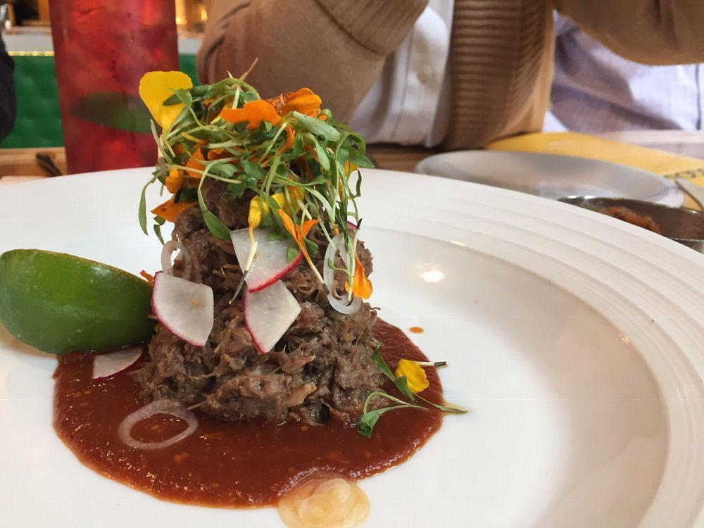 Barbacoa · Braised lean wagyu beef cheek and red guajillo cascabel salsa with house-made corn tortillas.
