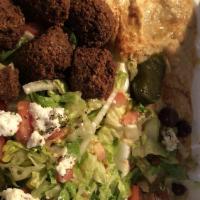 6 Piece Falafel Platter · Falafel with Greek salad, hummus, and choice of one side.