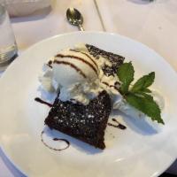Brownie Overload · Vanilla ice cream, whipped cream, and chocolate syrup.