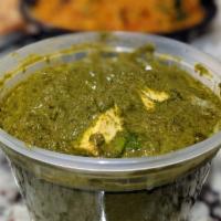 Palak Paneer · Spinach cooked with fresh homemade cheese.