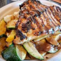 Chicken Marsala Plate · Grilled chicken breast topped with Marsala wine and roasted garlic sauce. Served with season...