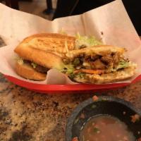 Torta · Fresh roll with mayo, beans, lettuce, tomato, avocado, sour cream, cheese, and your choice o...