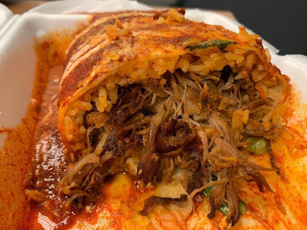 Carnitas Burrito · Slow cooked pork.