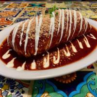 Burrito Mojado · Wet burrito. Rojo o verde. Served with a choice of style.