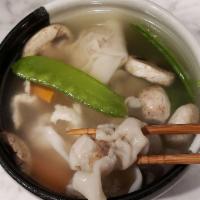 Wonton Soup · A hearty yet healthy bowl of soup filled with veggies and wonton dumplings.