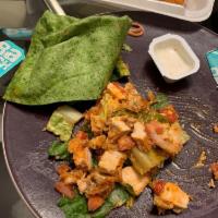 Buffalo Chicken Wrap · Breaded chicken tossed in our hot sauce with shredded lettuce and our ranch dressing. Served...