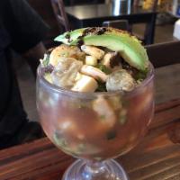 Campechana · Seafood cocktail with marinated shrimp in lime, boiled shrimp, octopus, oyster, abalone, oni...