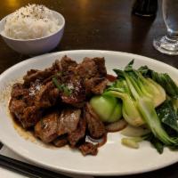Korean Beef · Tender slices of our Korean-style marinated beef served with wok-seared baby bok choy. Serve...