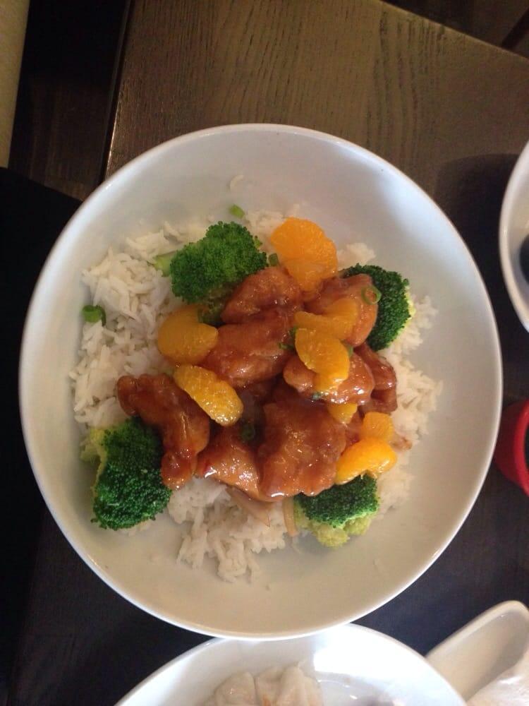 Orange Chicken · Crispy chunks of chicken breast tossed in a flavorful sauce with mandarin oranges and a hint of chili. Served with choice of white or brown rice. 
