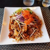 Pad Thai Noodles · Squeeze the lime. Pan fried thin rice noodle, carrot, bean sprout, leek, lime, and crushed p...