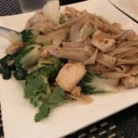 Drunken Noodles · Wide flat noodle pan fried with basil, cabbage, onion, broccoli, mushroom, and spicy chili g...