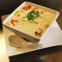 Tom Kha · Coconut soup with lemongrass, galangal, carrot, cabbage, mushroom, onion, cilantro, and kaff...