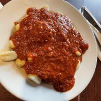 Gnocchi · Italian potato dumplings and a meatball in homemade red sauce.