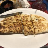 Taco El Chapo · Al Pastor and Carne Asada in a large flour tortilla smothered in melted mozzarella cheese, g...