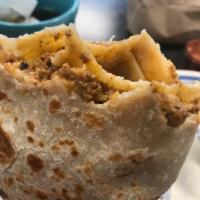 Shredded Beef Burrito · Repried beans, rice, pico de gallo, and guacamole.
