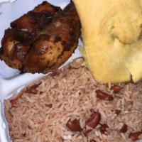 Jerk Chicken · Served with Rice and Peas or White Rice and Choice of Cabbage or Plantains.
