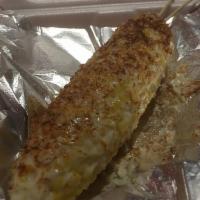 Elote Loco · Corn on the cob lightly coated with mayo and covered with Cotija cheese and dusted with chil...